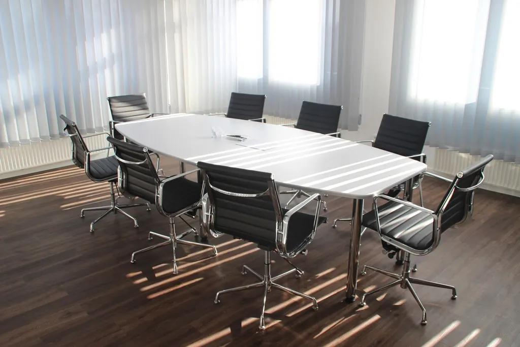 Sunlit meeting room with a long table