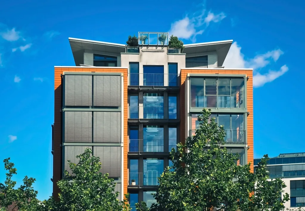 Modern apartment building framed by trees